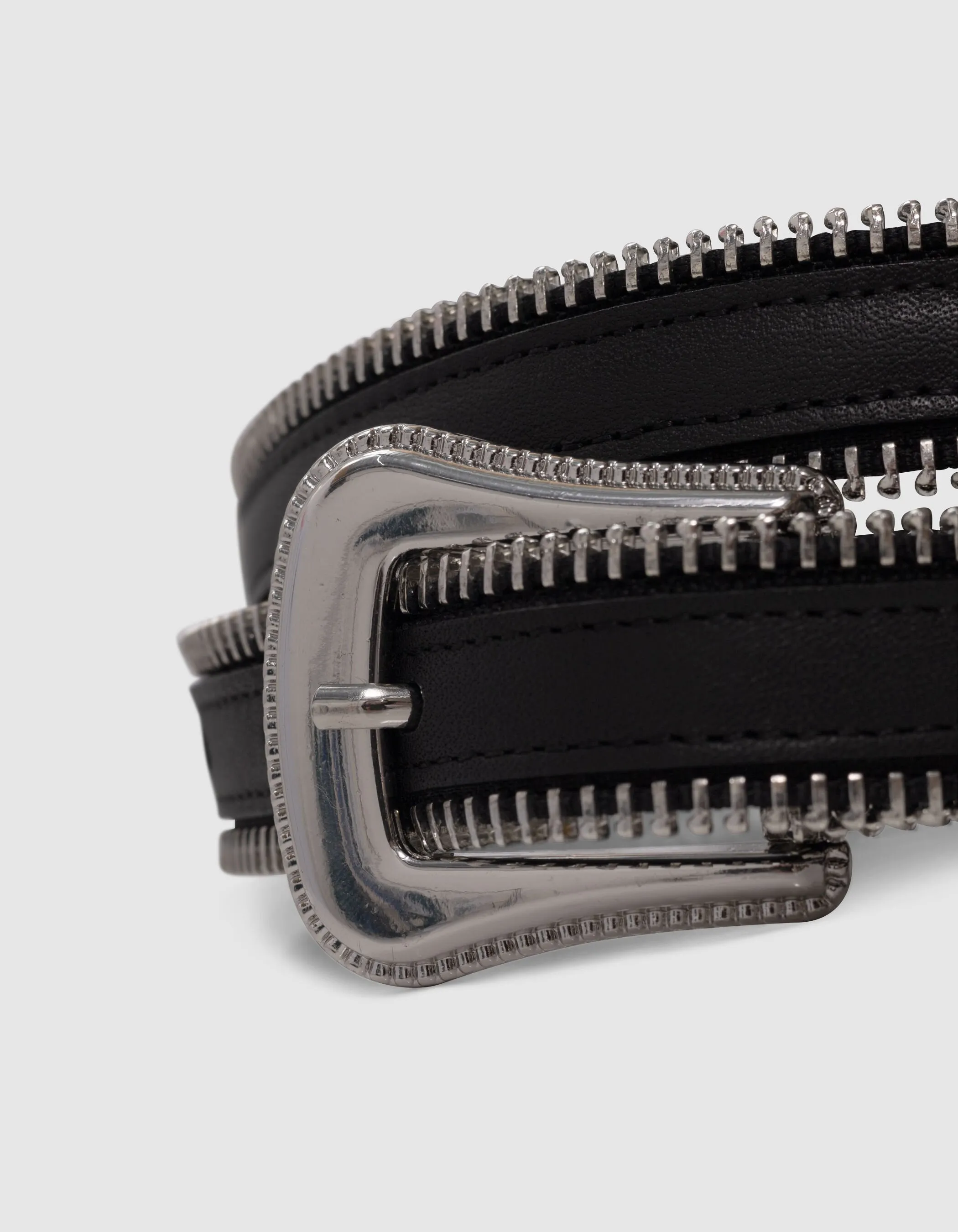 Ceinture noire cuir détails zips bout métal Femme