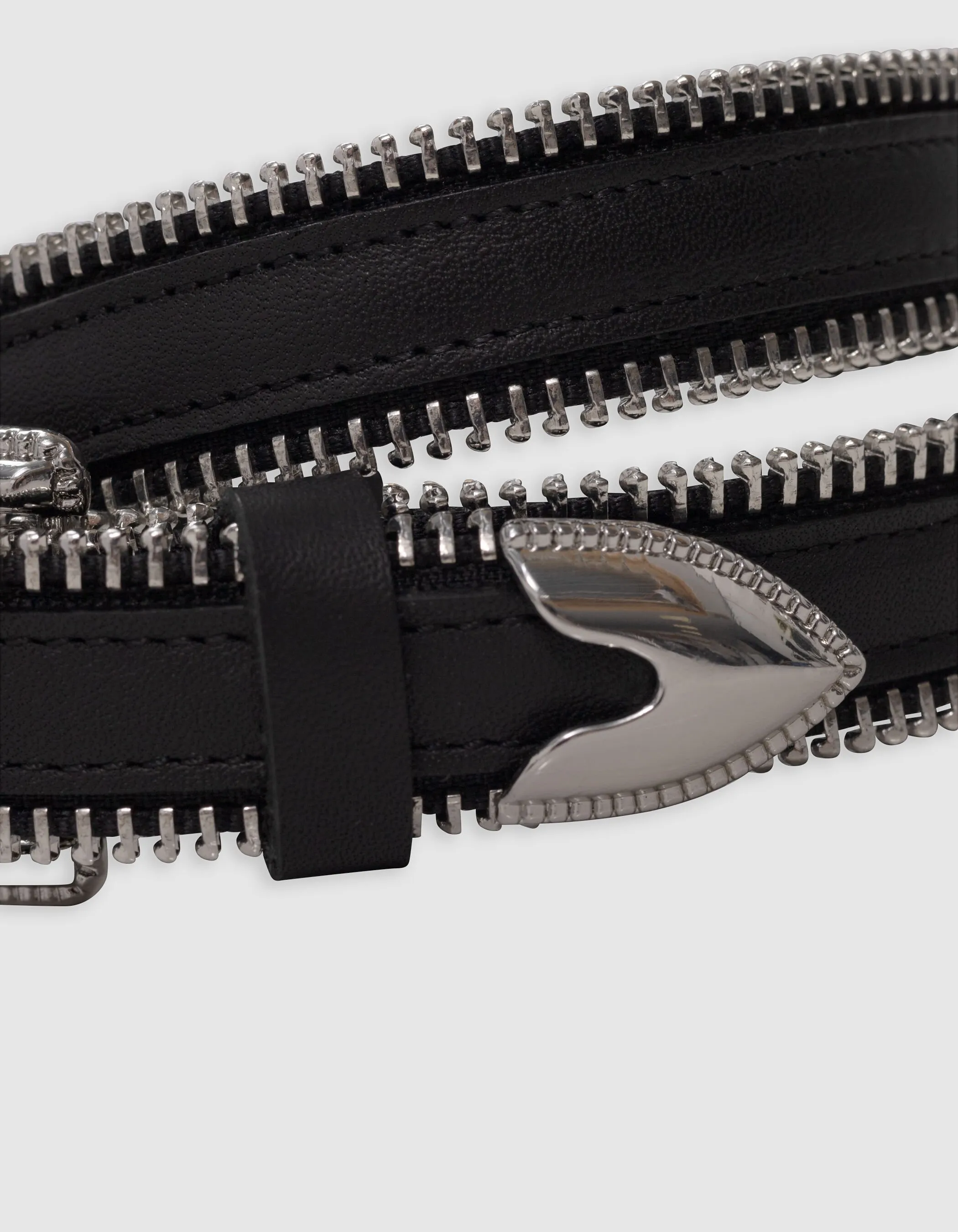 Ceinture noire cuir détails zips bout métal Femme